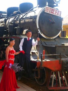 Bride and groom at a train station in Da Lat