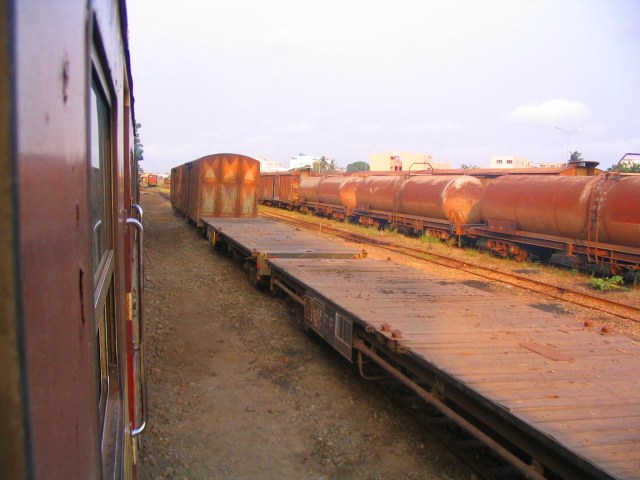 Trucks on the tracks at Cotonou station