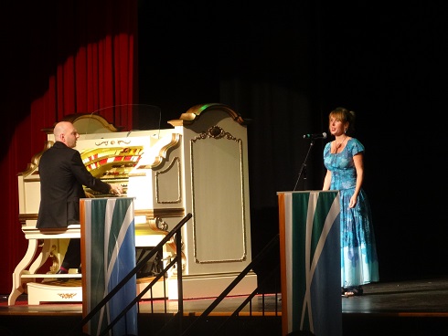 Opera singer with the organist.