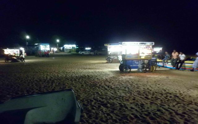 Beach north of Colombo, with vendors ready for hungry visitors