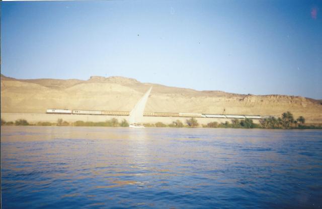 A single sail boat on the Nile
