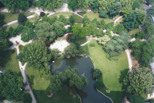 The Eiffel Tower casts a shadow.
