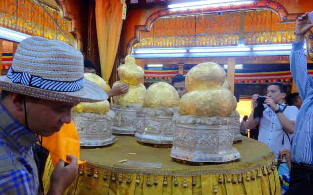 Inside, if you can believe, are little Buddha statues.