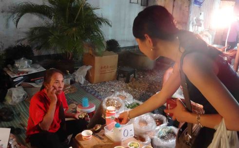 Buying at the night market.