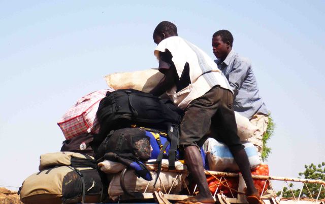 Packing the bags onto our bush taxi.