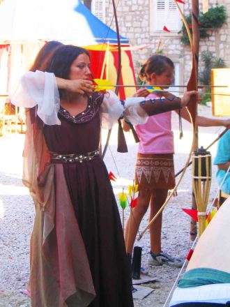 Dress ups and arrows at the Medieval Festival