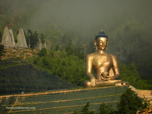 The giant statue of contemplating Buddha gleaming in the rays of morning sun, Thimphu, Bhutan