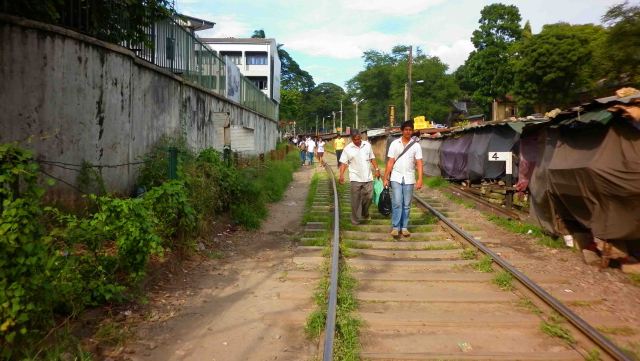 Walking along the tracks in Kandy.