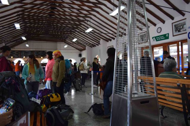 Inside Poroy station as the passengers gather,